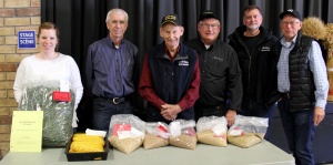 A group of men standing next to each other.