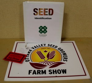 A seed identification book and sign for the ottawa valley seed growers ' farm show.