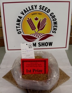 A bag of grain sitting on top of the ground.